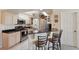 Modern kitchen with granite countertops and stainless steel appliances at 1005 Mizzen Ct, Tarpon Springs, FL 34689