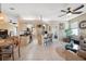 Open concept kitchen and dining area with breakfast bar at 1005 Mizzen Ct, Tarpon Springs, FL 34689