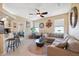 Spacious living room with comfortable seating and large windows at 1005 Mizzen Ct, Tarpon Springs, FL 34689