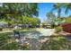 Enjoy a game of shuffleboard in this community space at 1005 Mizzen Ct, Tarpon Springs, FL 34689