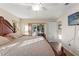 Comfortable main bedroom with access to the pool area at 10451 Keystone St, Spring Hill, FL 34608
