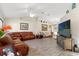 Spacious living room with hardwood floors and comfortable seating at 10451 Keystone St, Spring Hill, FL 34608