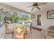 Relaxing screened pool area with patio furniture at 10451 Keystone St, Spring Hill, FL 34608