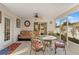 Relaxing screened porch with seating area and view of backyard at 10451 Keystone St, Spring Hill, FL 34608
