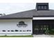 Summertree Golf Club building with signage and entrance at 11243 Merganser Way, New Port Richey, FL 34654