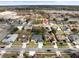 Aerial view of a residential neighborhood with various homes and landscaping at 1230 Venetia Dr, Spring Hill, FL 34608