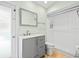Clean bathroom with gray vanity and shower at 1230 Venetia Dr, Spring Hill, FL 34608