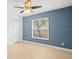 Bedroom with tile floors and ceiling fan at 1230 Venetia Dr, Spring Hill, FL 34608