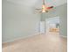 Main bedroom with access to ensuite bathroom at 1230 Venetia Dr, Spring Hill, FL 34608