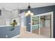 Spacious dining area features a view of the backyard and pool at 1230 Venetia Dr, Spring Hill, FL 34608