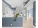 Bright kitchen boasts updated countertops and a breakfast bar at 1230 Venetia Dr, Spring Hill, FL 34608