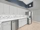 Updated kitchen with white cabinets and granite countertops at 1230 Venetia Dr, Spring Hill, FL 34608