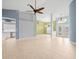 Spacious living room with tile floors and high ceilings at 1230 Venetia Dr, Spring Hill, FL 34608