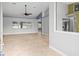 Spacious living room with high ceilings and ceiling fan at 1230 Venetia Dr, Spring Hill, FL 34608