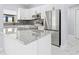 Modern kitchen featuring stainless steel appliances and granite countertops at 13124 Lawrence St, Spring Hill, FL 34609