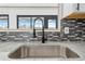 Modern kitchen sink with a black gooseneck faucet at 13124 Lawrence St, Spring Hill, FL 34609