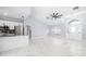 Modern white kitchen with stainless steel appliances at 13124 Lawrence St, Spring Hill, FL 34609