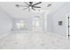 Open living area with marble floors and high ceilings at 13124 Lawrence St, Spring Hill, FL 34609