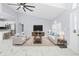 Spacious living room with marble floors, and modern furniture at 13124 Lawrence St, Spring Hill, FL 34609