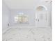 Open living space with marble floors and high ceilings at 13124 Lawrence St, Spring Hill, FL 34609