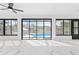 Screened pool area with view of the backyard at 13124 Lawrence St, Spring Hill, FL 34609