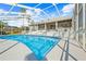 Inviting screened-in pool with ample deck space at 13124 Lawrence St, Spring Hill, FL 34609