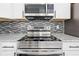 Stainless steel range and microwave combination at 13124 Lawrence St, Spring Hill, FL 34609