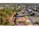 Aerial view of house and surrounding neighborhood at 13793 Dunwoody Dr, Spring Hill, FL 34609
