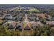 Aerial view of a house and neighborhood, showcasing the surrounding area at 13793 Dunwoody Dr, Spring Hill, FL 34609
