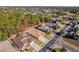 Aerial view of homes and landscape in a residential neighborhood at 13793 Dunwoody Dr, Spring Hill, FL 34609