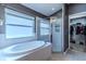 Bathroom boasts a large garden tub and walk-in shower at 13793 Dunwoody Dr, Spring Hill, FL 34609