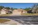 Two-car garage and inviting front entrance at 13793 Dunwoody Dr, Spring Hill, FL 34609