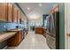 Bright kitchen with stainless steel appliances and ample counter space at 13793 Dunwoody Dr, Spring Hill, FL 34609