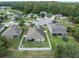 Aerial view showcasing home's backyard and neighborhood at 18732 Dobson Dr, Hudson, FL 34667