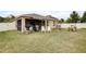 Spacious backyard with screened patio, great for outdoor entertaining at 18732 Dobson Dr, Hudson, FL 34667