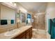Double vanity bathroom with updated fixtures and shower at 18732 Dobson Dr, Hudson, FL 34667