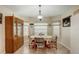 Bright dining area with built-in hutch and window seat at 18732 Dobson Dr, Hudson, FL 34667