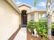 Front entry with walkway and landscaping at 18732 Dobson Dr, Hudson, FL 34667
