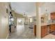 Open living room with tile floors and access to the patio at 18732 Dobson Dr, Hudson, FL 34667