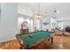 Game room with hardwood floors and a pool table at 19617 Ellendale Dr, Land O Lakes, FL 34638