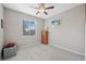 Spacious bedroom with ceiling fan and neutral decor at 3110 Lema Dr, Spring Hill, FL 34609
