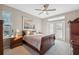 Bright bedroom with wood furniture and access to patio at 3110 Lema Dr, Spring Hill, FL 34609