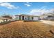 House exterior with driveway and landscaping at 3110 Lema Dr, Spring Hill, FL 34609