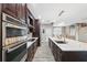 Modern kitchen with stainless steel appliances and large island at 3110 Lema Dr, Spring Hill, FL 34609