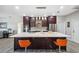 Modern kitchen with stainless steel appliances and large island at 3110 Lema Dr, Spring Hill, FL 34609