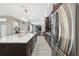 Modern kitchen with stainless steel appliances and large island at 3110 Lema Dr, Spring Hill, FL 34609