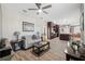 Open concept living room with view into kitchen at 3110 Lema Dr, Spring Hill, FL 34609