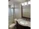 Bathroom with granite vanity and shower/tub combo at 3151 Carlos Dr, Dunedin, FL 34698