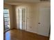 Bedroom with hardwood floors, window, and closet at 3151 Carlos Dr, Dunedin, FL 34698