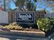 Spanish Acres community entrance sign at 3151 Carlos Dr, Dunedin, FL 34698